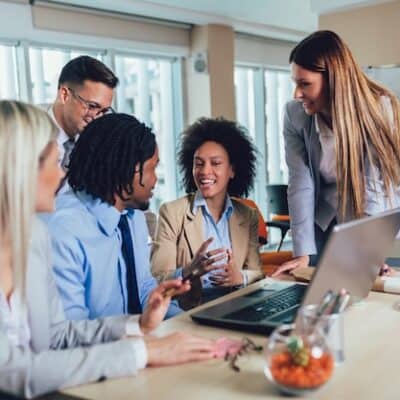 A group of young business professionals collaborating in a productive meeting.